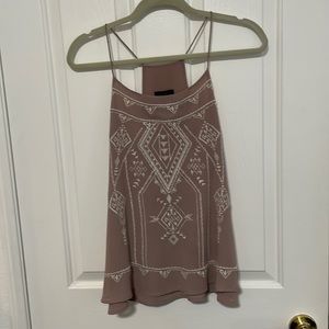 Mauve top with cream stitching size large